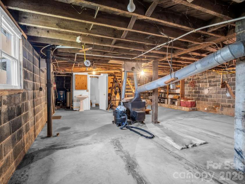 1086 Carters Ridge Road, Spruce Pine, NC 28777.  MLS# CAR4351879, YatesRealty ID 10853. Basement