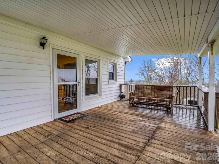 1086 Carters Ridge Road, Spruce Pine, NC 28777.  MLS# CAR4406527, YatesRealty ID 10853. Side Covered Porch