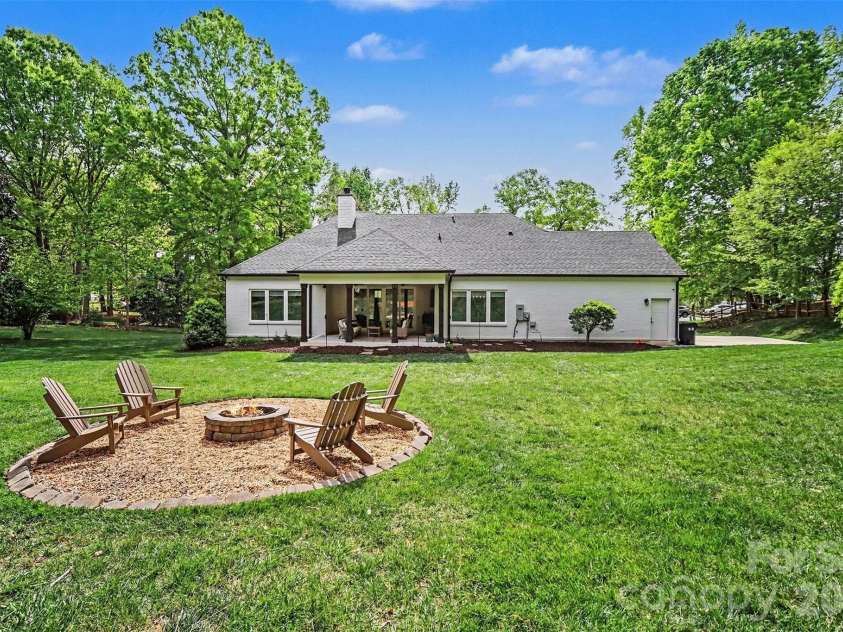 4317 Steepleton Way, Charlotte, NC 28215.  MLS# CAR4363516, YatesRealty ID 10864. Backyard with firepit