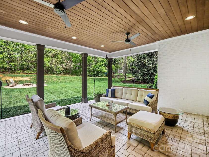 4317 Steepleton Way, Charlotte, NC 28215.  MLS# CAR4363516, YatesRealty ID 10864. Covered back porch
