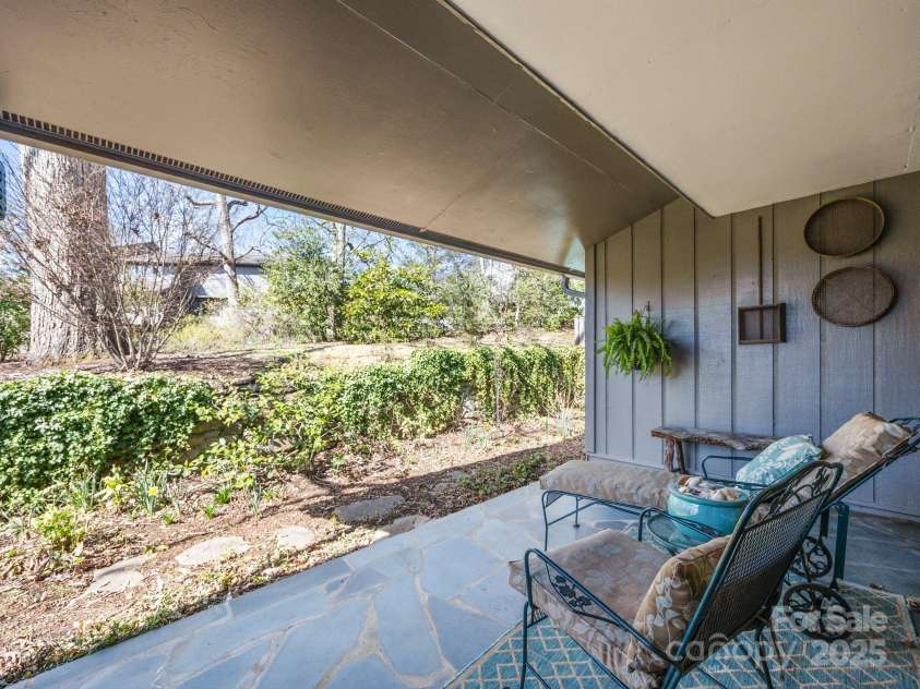 214 Crowfields Drive, Asheville, NC 28803.  MLS# CAR4231576, YatesRealty ID 10869. Covered Patio