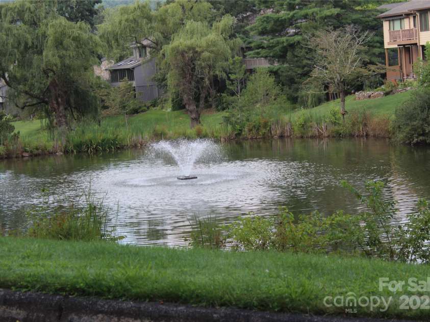 214 Crowfields Drive, Asheville, NC 28803.  MLS# CAR4231576, YatesRealty ID 10869. Reflecting Ponds