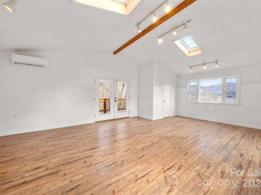 14 Old Chunns Cove Road, Asheville, NC 28805.  MLS# CAR4211923, YatesRealty ID 10871. Large Room Above Garage