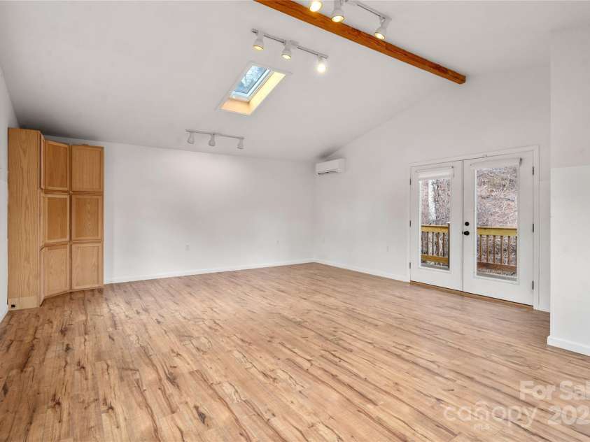 14 Old Chunns Cove Road, Asheville, NC 28805.  MLS# CAR4211923, YatesRealty ID 10871. Large Room Above Garage