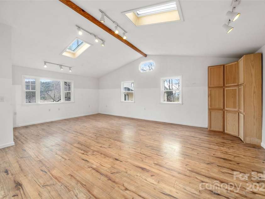 14 Old Chunns Cove Road, Asheville, NC 28805.  MLS# CAR4211923, YatesRealty ID 10871. Room Above Garage