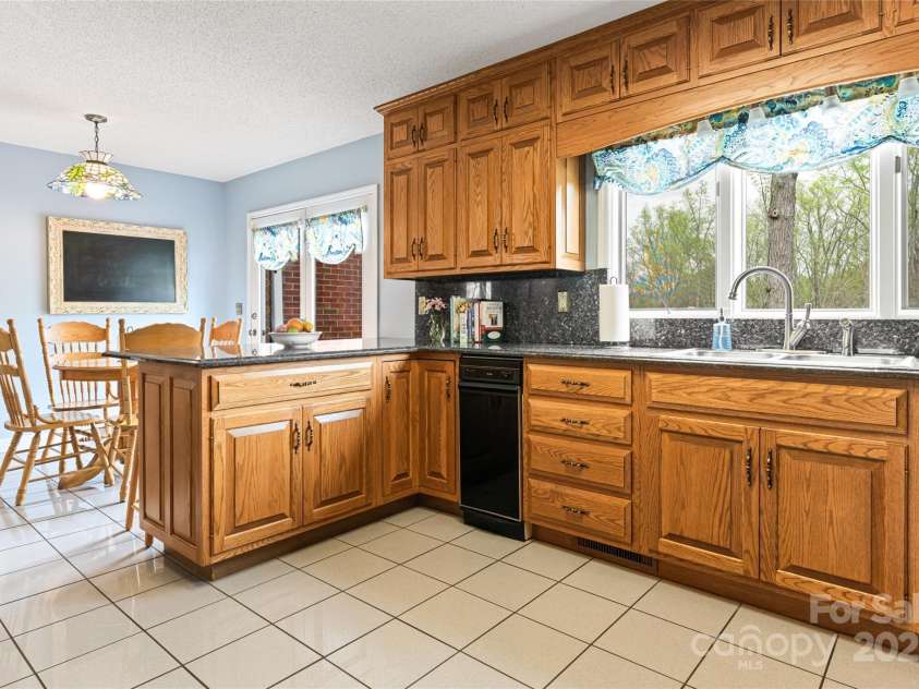 735 Macedonia Road, Asheville, NC 28804.  MLS# CAR4098577, YatesRealty ID 10873. 