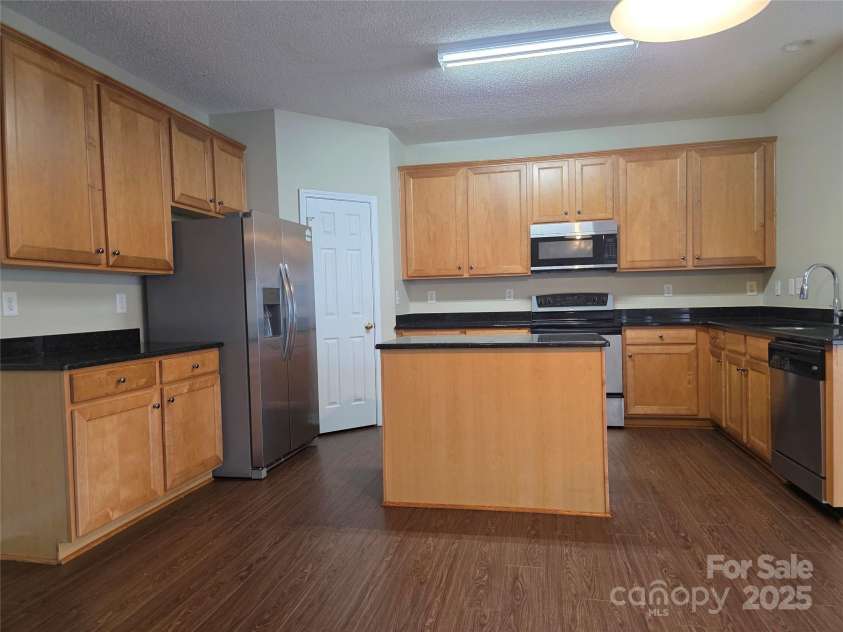 8323 Carolina Laurel Court, Charlotte, NC 28215.  MLS# CAR4247462, YatesRealty ID 10875. 