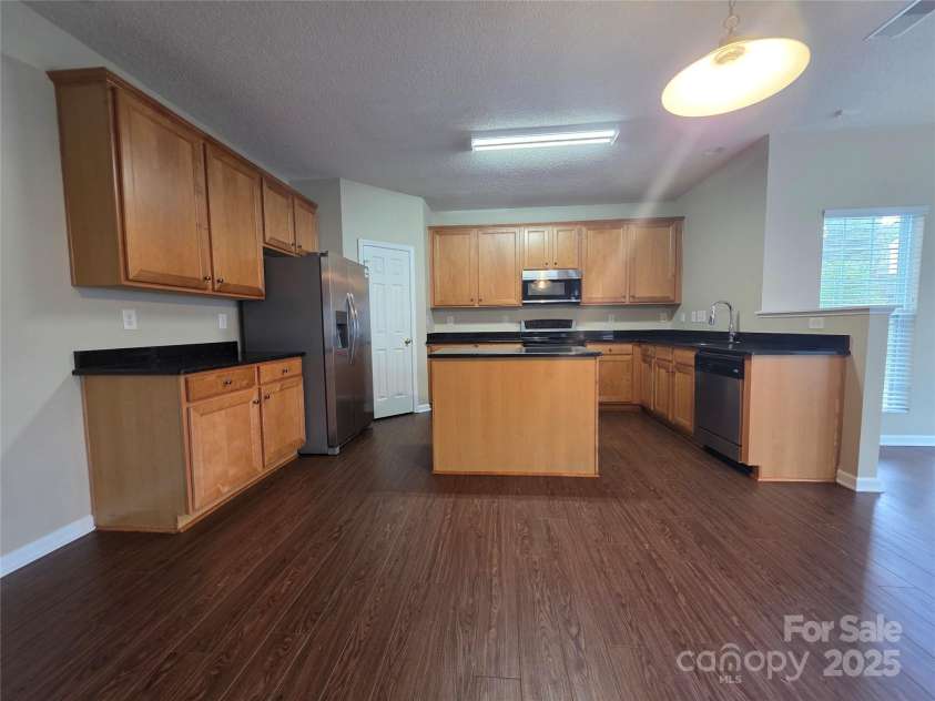 8323 Carolina Laurel Court, Charlotte, NC 28215.  MLS# CAR4247462, YatesRealty ID 10875. 