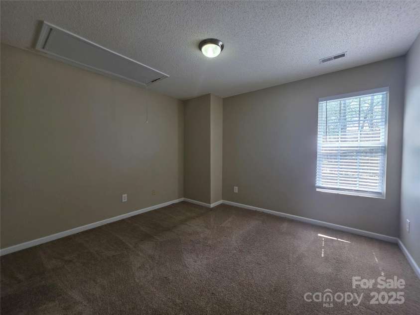 8323 Carolina Laurel Court, Charlotte, NC 28215.  MLS# CAR4247462, YatesRealty ID 10875. 