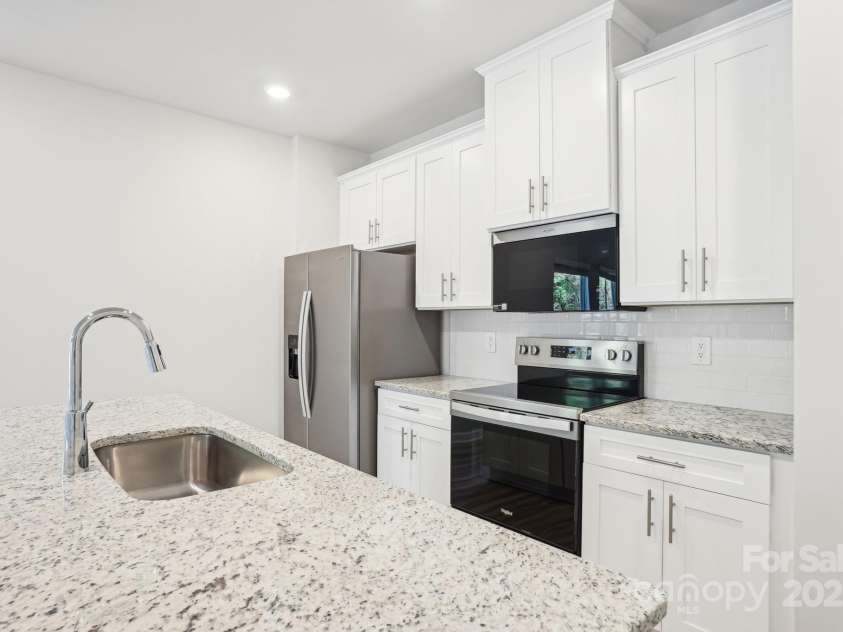 105 Ciara Place, Mooresville, NC 28115.  MLS# CAR4311417, YatesRealty ID 10878. Photo is not of the actual home, but is an inspirational photo of builder’s model home and may depict options, furnishings, and/or decorator features that are not included