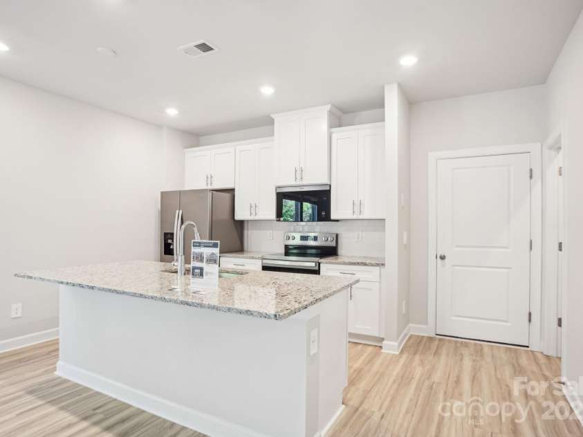 105 Ciara Place, Mooresville, NC 28115.  MLS# CAR4311417, YatesRealty ID 10878. Photo is not of the actual home, but is an inspirational photo of builder’s model home and may depict options, furnishings, and/or decorator features that are not included