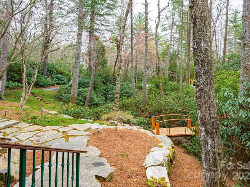 212 Shadybrook Trail, Hendersonville, NC 28739.  MLS# CAR4240276, YatesRealty ID 10878. Front landscaping