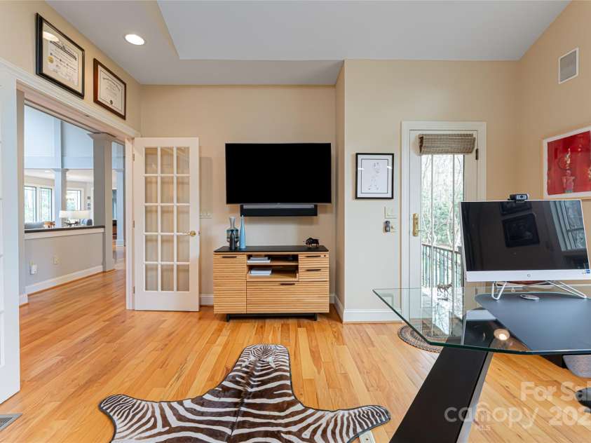 212 Shadybrook Trail, Hendersonville, NC 28739.  MLS# CAR4240276, YatesRealty ID 10878. Main level office with wet bar