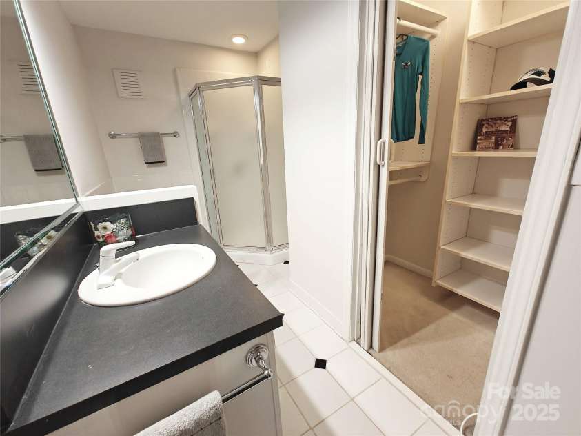 1323 Queens Road, Charlotte, NC 28207.  MLS# CAR4323169, YatesRealty ID 1088. Looking into Primary Walk In Closet