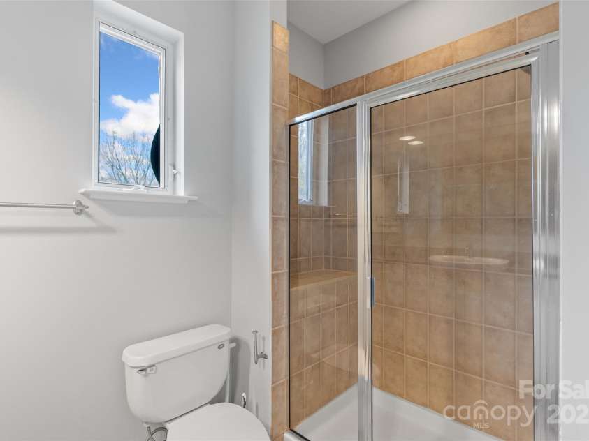 840 Garden District Drive, Charlotte, NC 28202.  MLS# CAR4238438, YatesRealty ID 10882. Primary Bedroom Tiled Shower