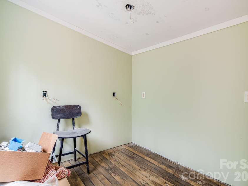 55 Heavenly Lane, Fairview, NC 28730.  MLS# CAR4341248, YatesRealty ID 10885. Inside tiny home