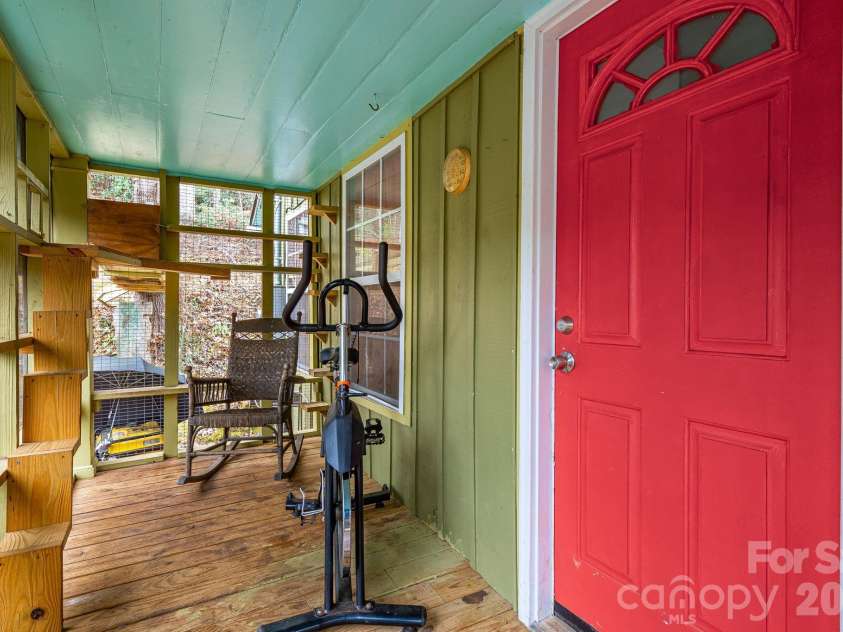 55 Heavenly Lane, Fairview, NC 28730.  MLS# CAR4341248, YatesRealty ID 10885. Screened in porch