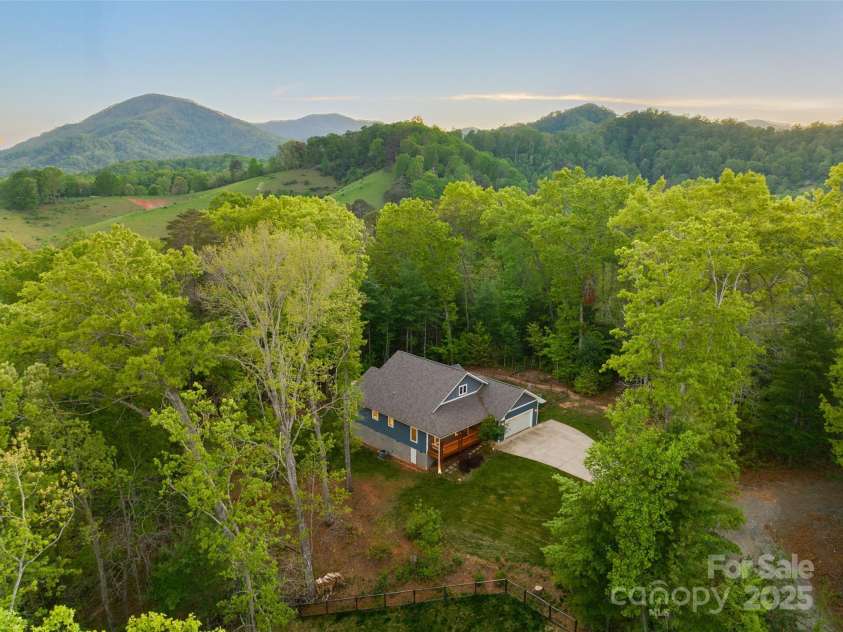 8 Clover Ridge Lane, Leicester, NC 28748.  MLS# CAR4247209, YatesRealty ID 10885. Surrounded by the beauty of the community