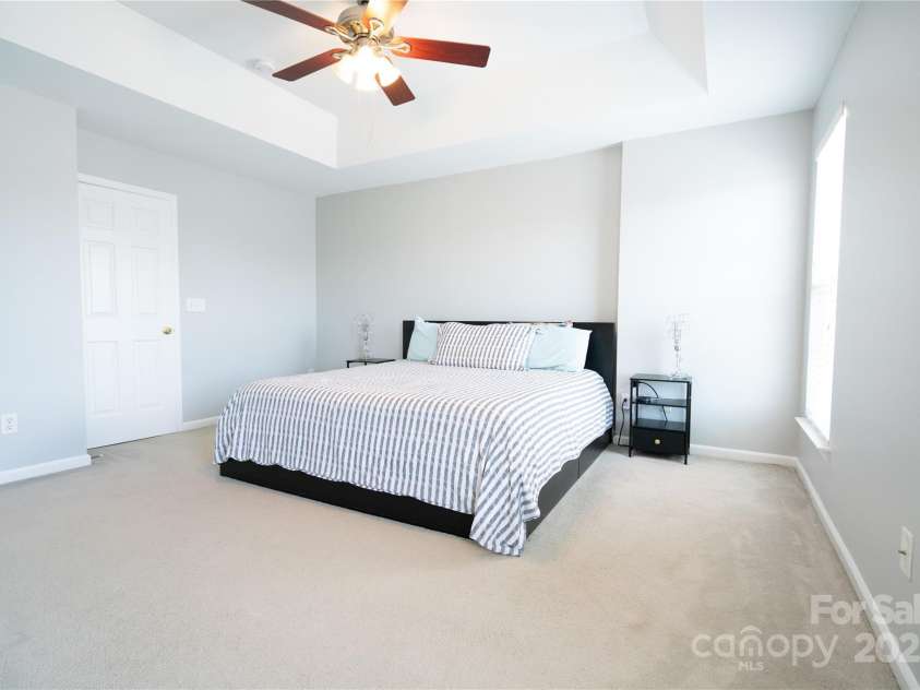9511 Lina Ardrey Lane, Charlotte, NC 28277.  MLS# CAR4269974, YatesRealty ID 1089. Primary bedroom with tray ceiling