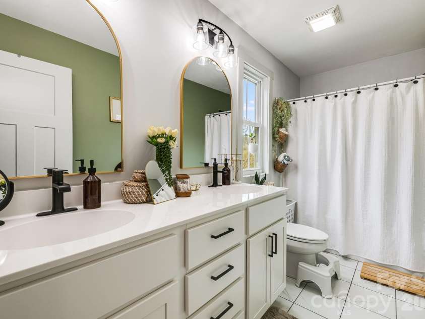 842 Old NC 20 Highway, Alexander, NC 28701.  MLS# CAR4353364, YatesRealty ID 10892. Dual Vanities in Primary Bathroom
