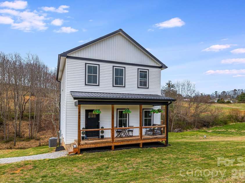 842 Old NC 20 Highway, Alexander, NC 28701.  MLS# CAR4353364, YatesRealty ID 10892. Front of Home