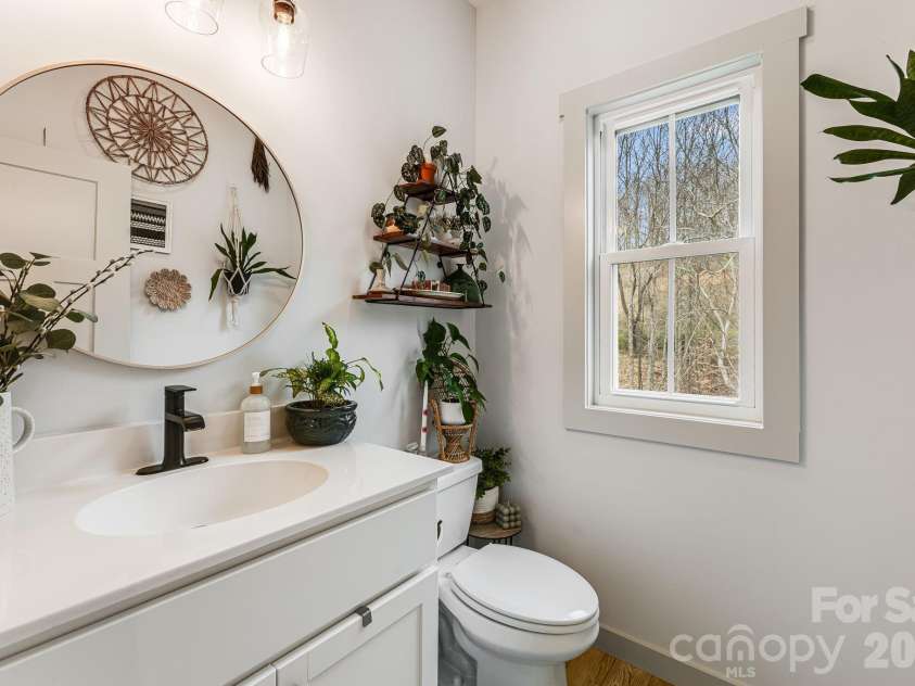 842 Old NC 20 Highway, Alexander, NC 28701.  MLS# CAR4353364, YatesRealty ID 10892. Half Bath on Main