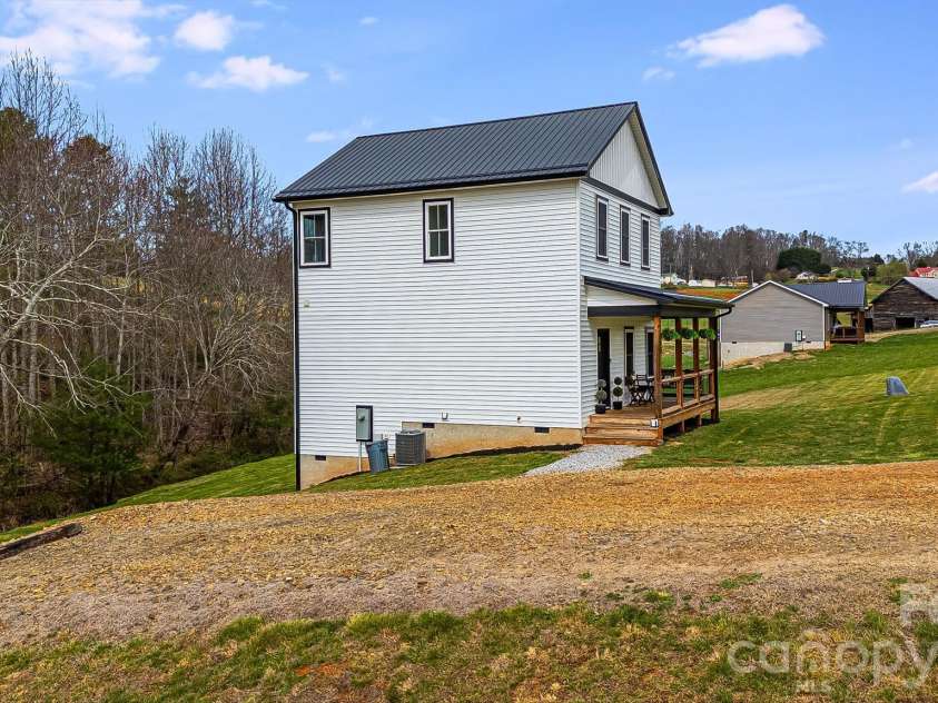 842 Old NC 20 Highway, Alexander, NC 28701.  MLS# CAR4353364, YatesRealty ID 10892. Side view of Home