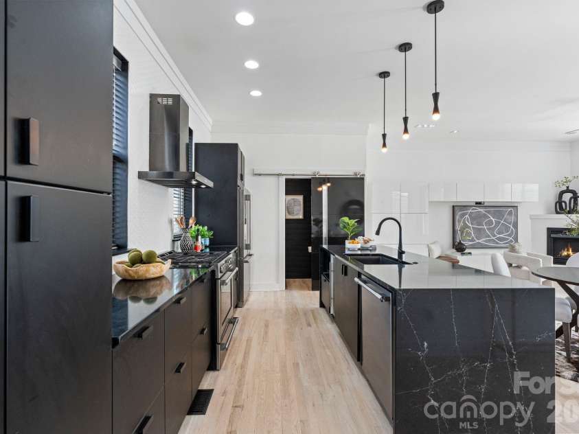 435 Steel Gardens Boulevard, Charlotte, NC 28205.  MLS# CAR4352693, YatesRealty ID 10901. Custom cabinetry to maximize storage.