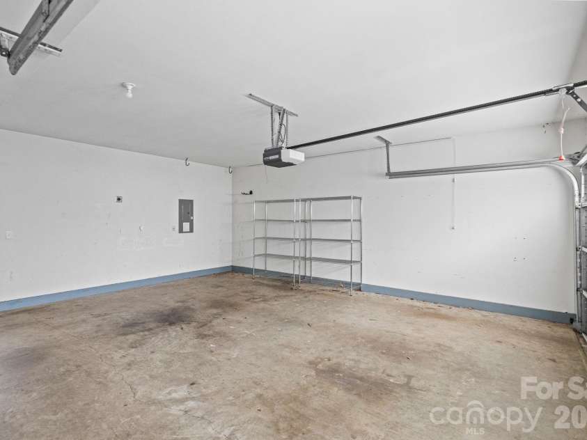 435 Steel Gardens Boulevard, Charlotte, NC 28205.  MLS# CAR4352693, YatesRealty ID 10901. Oversized 2-car garage with additional storage.