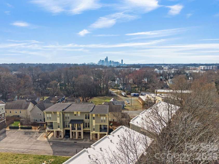435 Steel Gardens Boulevard, Charlotte, NC 28205.  MLS# CAR4352693, YatesRealty ID 10901. Uptown skyline.