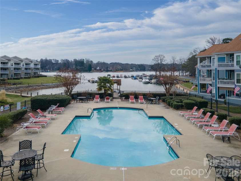 1113 Torrence Circle, Davidson, NC 28036.  MLS# CAR4337531, YatesRealty ID 10902. Community pool with great lakeviews.