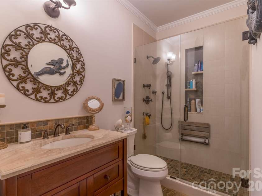 1113 Torrence Circle, Davidson, NC 28036.  MLS# CAR4337531, YatesRealty ID 10902. Custom furniture vanity.
