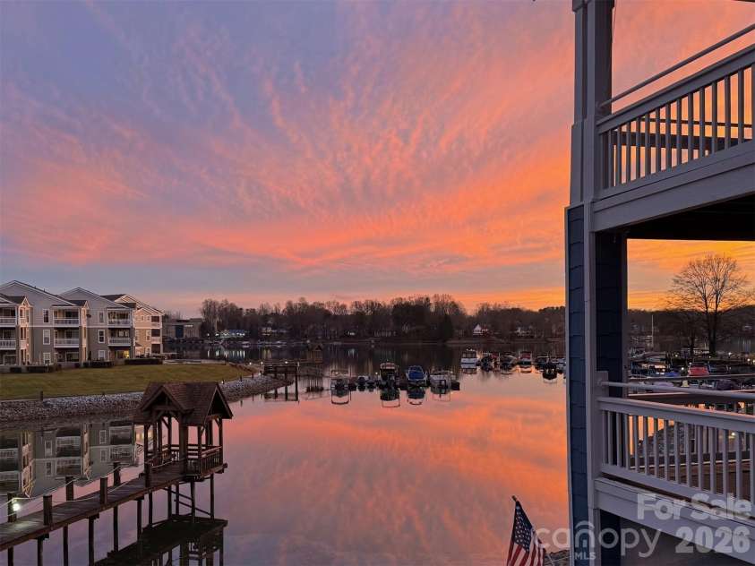 1113 Torrence Circle, Davidson, NC 28036.  MLS# CAR4337531, YatesRealty ID 10902. End you day looking at this sunset.