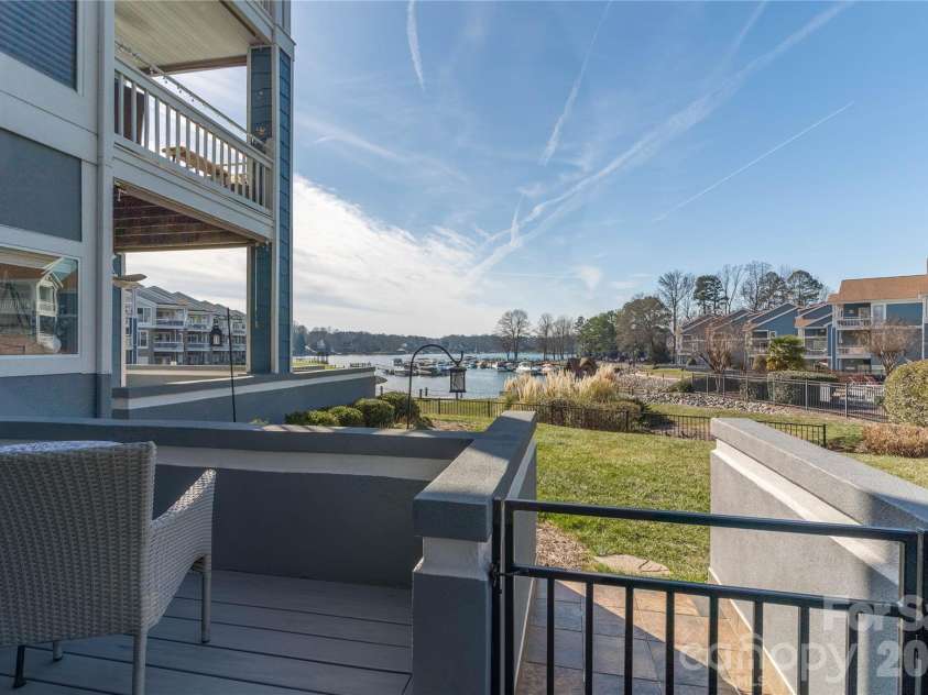 1113 Torrence Circle, Davidson, NC 28036.  MLS# CAR4337531, YatesRealty ID 10902. Great views year round from this patio.