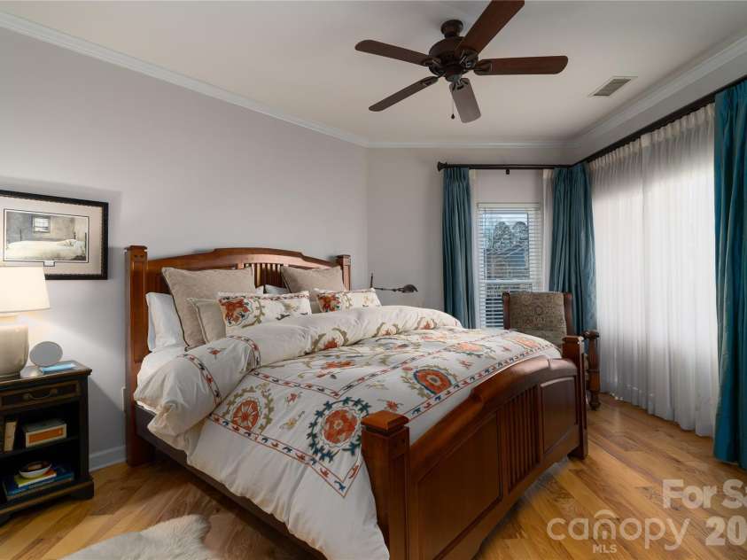 1113 Torrence Circle, Davidson, NC 28036.  MLS# CAR4337531, YatesRealty ID 10902. Patio doors walk out to oversized deck.