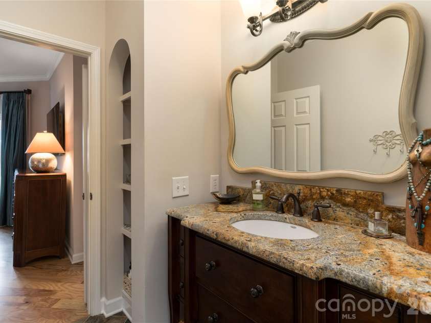 1113 Torrence Circle, Davidson, NC 28036.  MLS# CAR4337531, YatesRealty ID 10902. Primary bath with granite and furniture vanity.