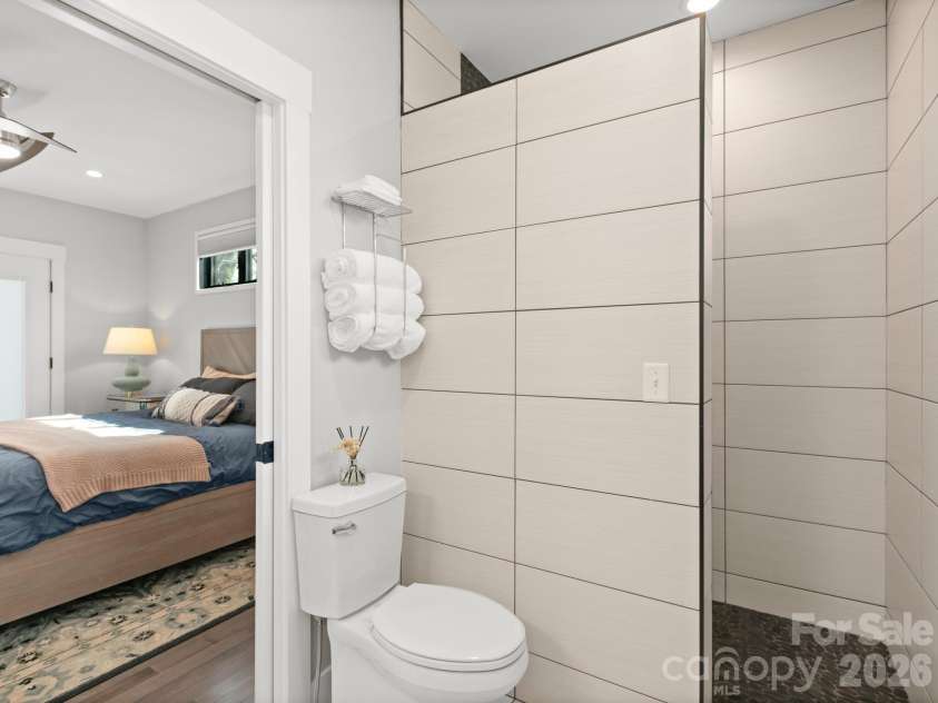 54 Howard Street, Asheville, NC 28806.  MLS# CAR4365542, YatesRealty ID 10903. Primary's full bathroom