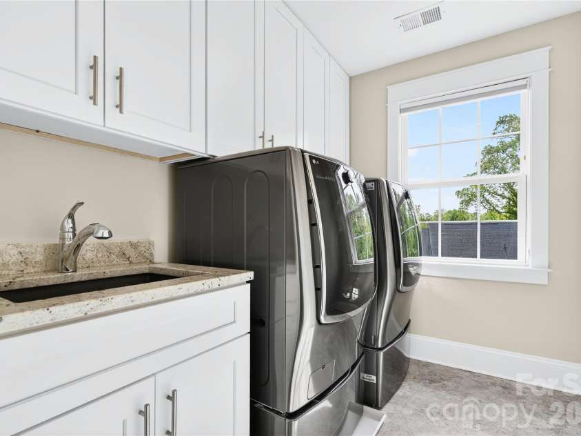 489 Main Street, Davidson, NC 28036.  MLS# CAR4366953, YatesRealty ID 10911. Dedicated Laundry Room (Anther On Upper Level)