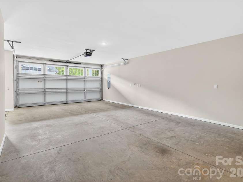 489 Main Street, Davidson, NC 28036.  MLS# CAR4366953, YatesRealty ID 10911. Deep 2-Car Garage Measuring 777 SF