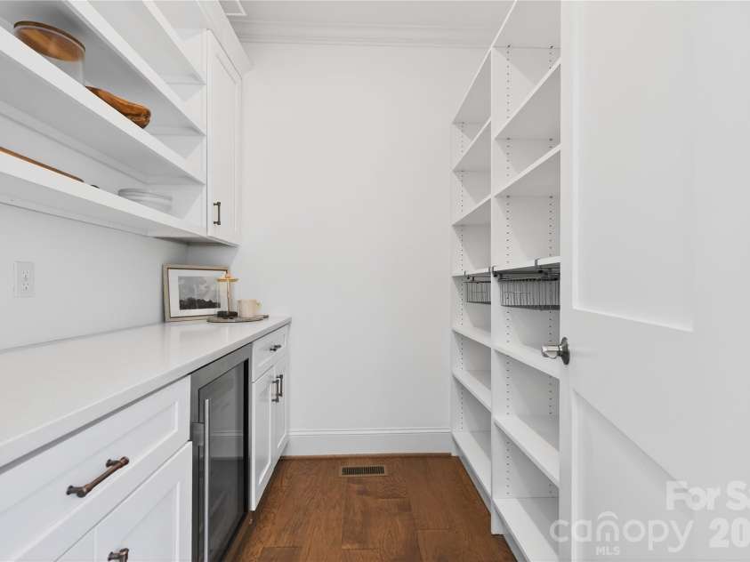 489 Main Street, Davidson, NC 28036.  MLS# CAR4366953, YatesRealty ID 10911. Walk-In Pantry With Beverage Refrigerator