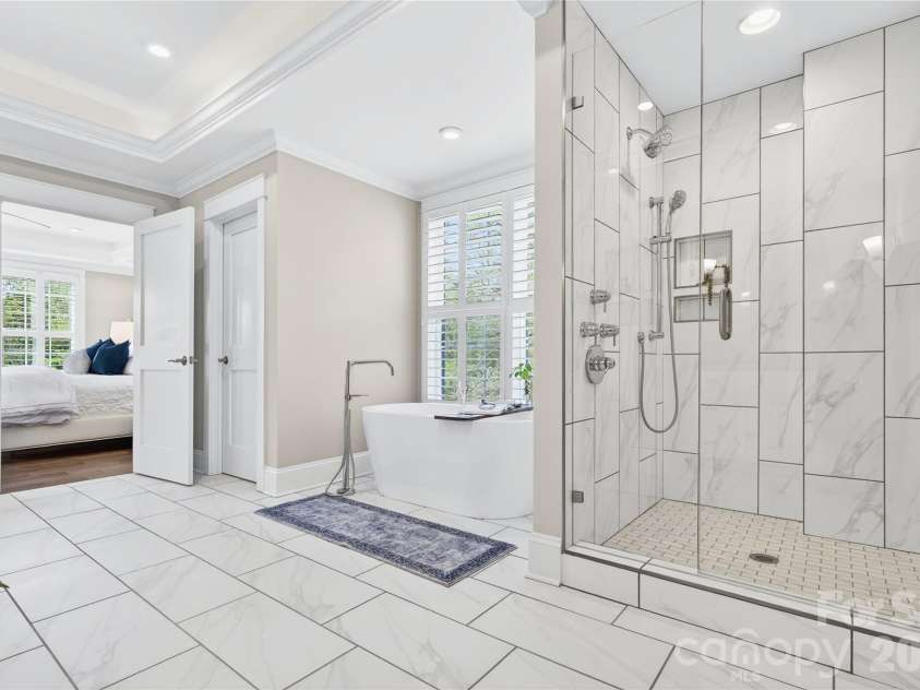 489 Main Street, Davidson, NC 28036.  MLS# CAR4366953, YatesRealty ID 10911. Walk-In Shower With Dual Heads And Jets