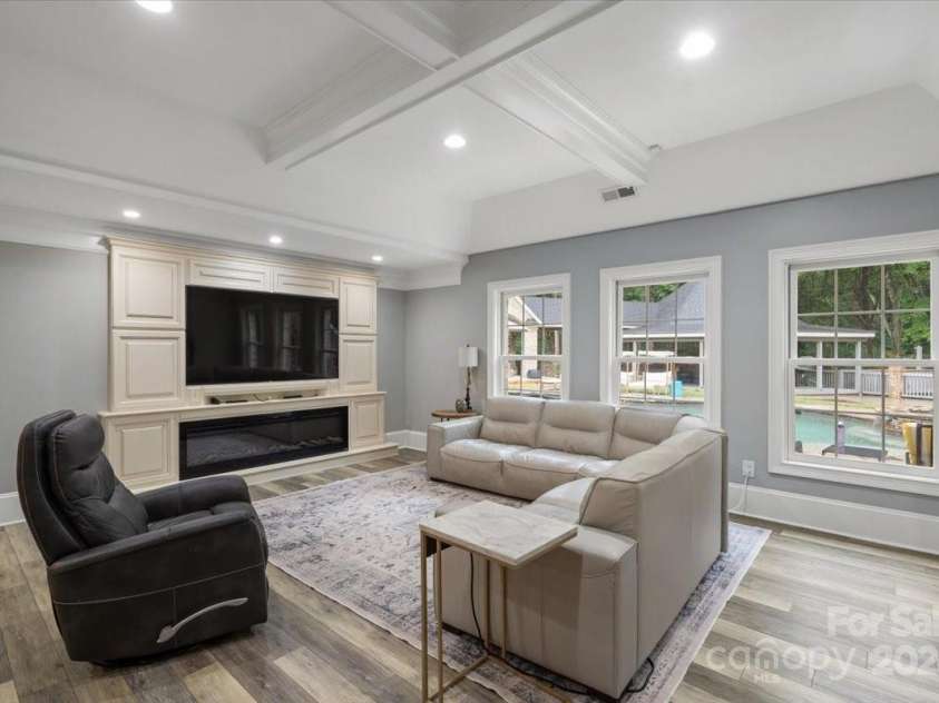 8516 Mcilwaine Road, Huntersville, NC 28078.  MLS# CAR4164588, YatesRealty ID 10913. Basement family room