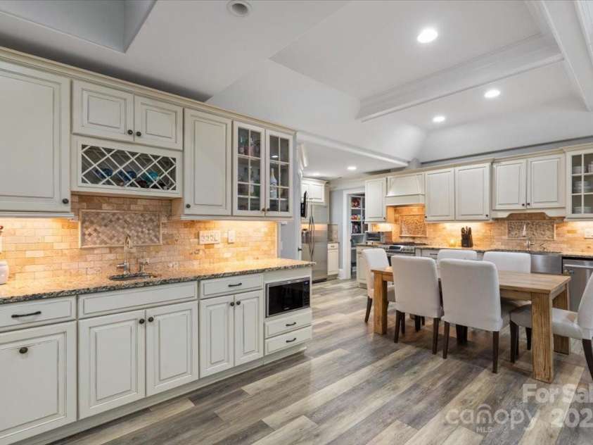 8516 Mcilwaine Road, Huntersville, NC 28078.  MLS# CAR4164588, YatesRealty ID 10913. Basement Kitchen