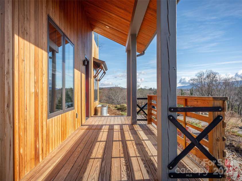 110 Abundance Run, Asheville, NC 28805.  MLS# CAR4208378, YatesRealty ID 10914. Beautiful views from the front porch