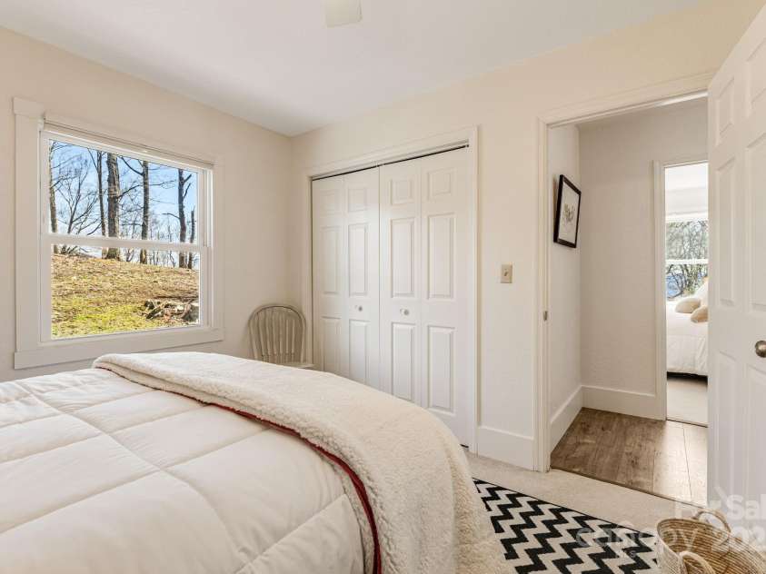 129 Finney Lane, Mars Hill, NC 28754.  MLS# CAR4243744, YatesRealty ID 10915. 2nd level bedroom.