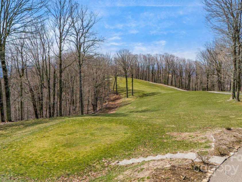 129 Finney Lane, Mars Hill, NC 28754.  MLS# CAR4243744, YatesRealty ID 10915. Back yard