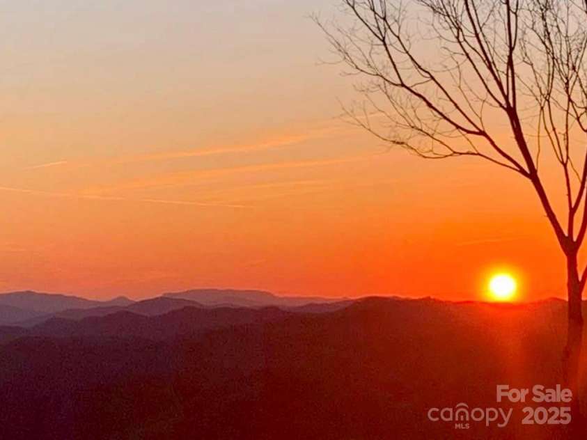 129 Finney Lane, Mars Hill, NC 28754.  MLS# CAR4243744, YatesRealty ID 10915. Beautiful sunset views await you from your home in the Blue Ridge Mountains.