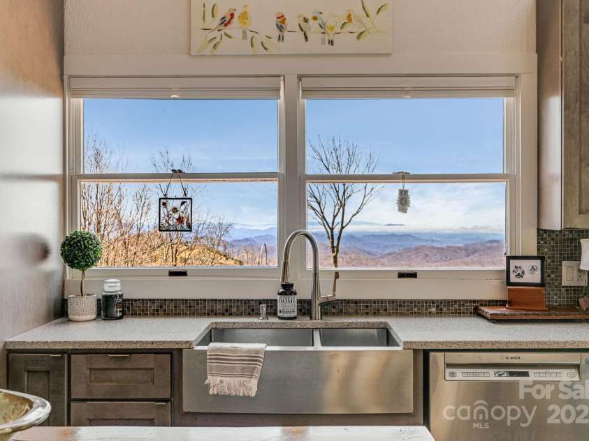 129 Finney Lane, Mars Hill, NC 28754.  MLS# CAR4243744, YatesRealty ID 10915. Doing the dishes is not so bad with views like this.