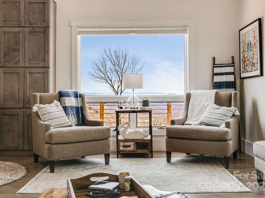 129 Finney Lane, Mars Hill, NC 28754.  MLS# CAR4243744, YatesRealty ID 10915. Dreamy seating area.