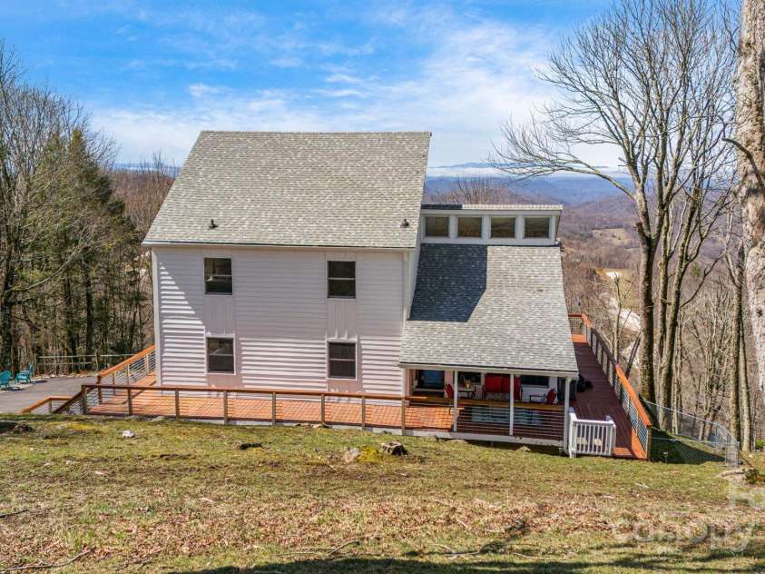 129 Finney Lane, Mars Hill, NC 28754.  MLS# CAR4243744, YatesRealty ID 10915. Golf course view of 129 Finney Ln.